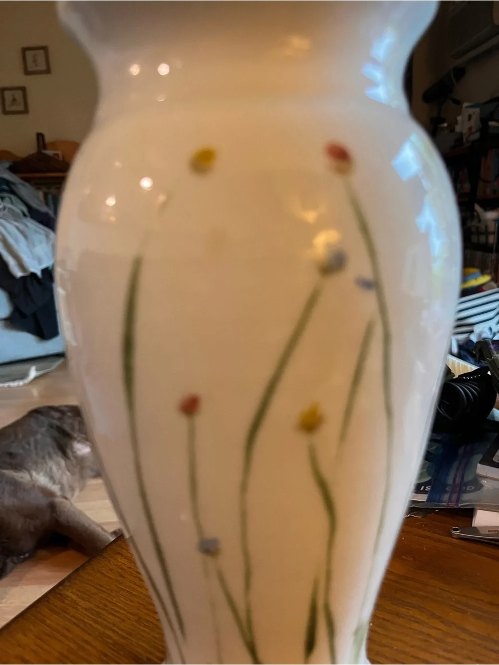 Sheepscott River Pottery tall fluted vase in Meadow design. Vase stands 10 1/2”.
